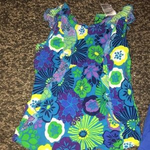 3 tank tops and one pair of shorts